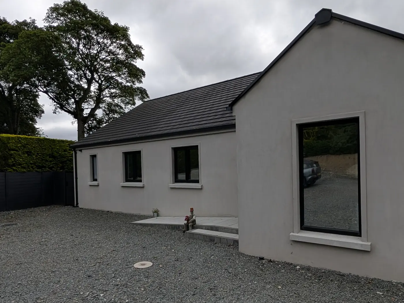 Bungalow gable window, privacy film after window film installation