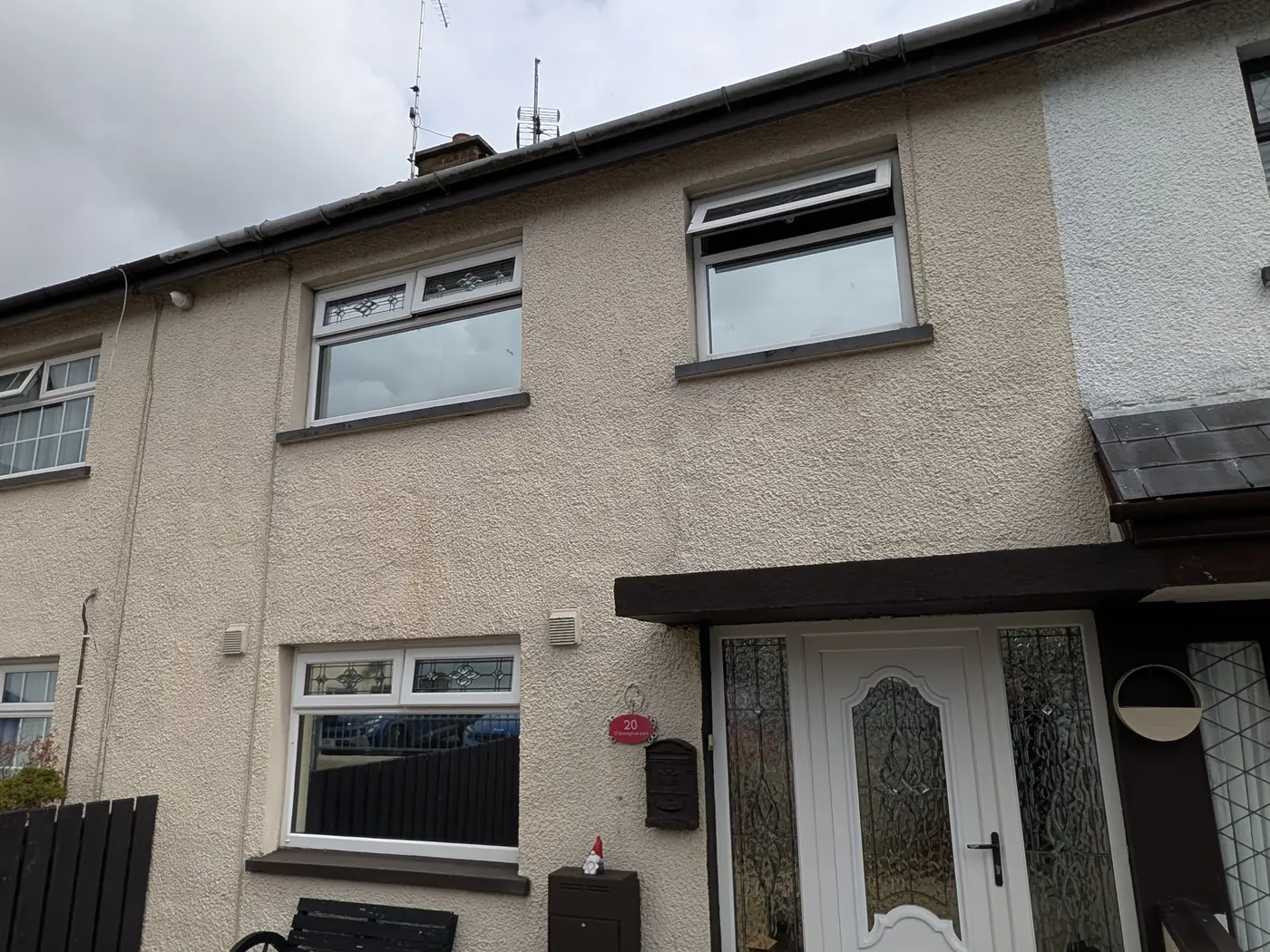 Terraced house front, privacy film after window film installation