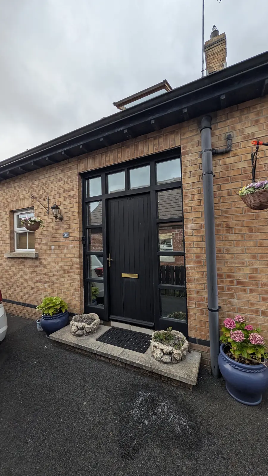 Front door glazing with privacy film