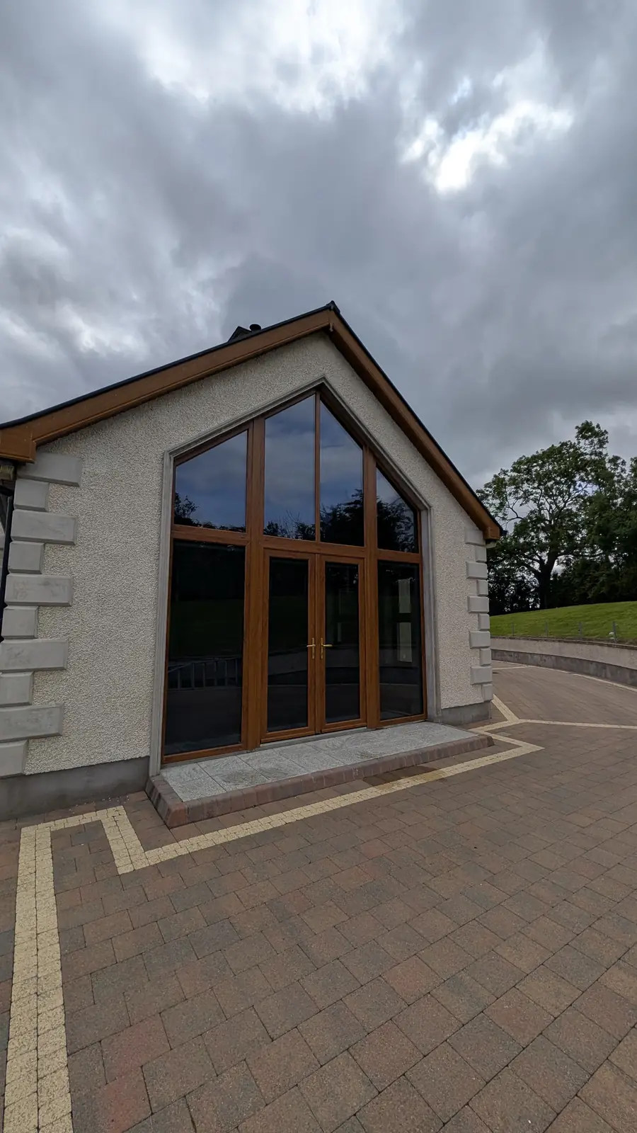 Glazed gable end with privacy film