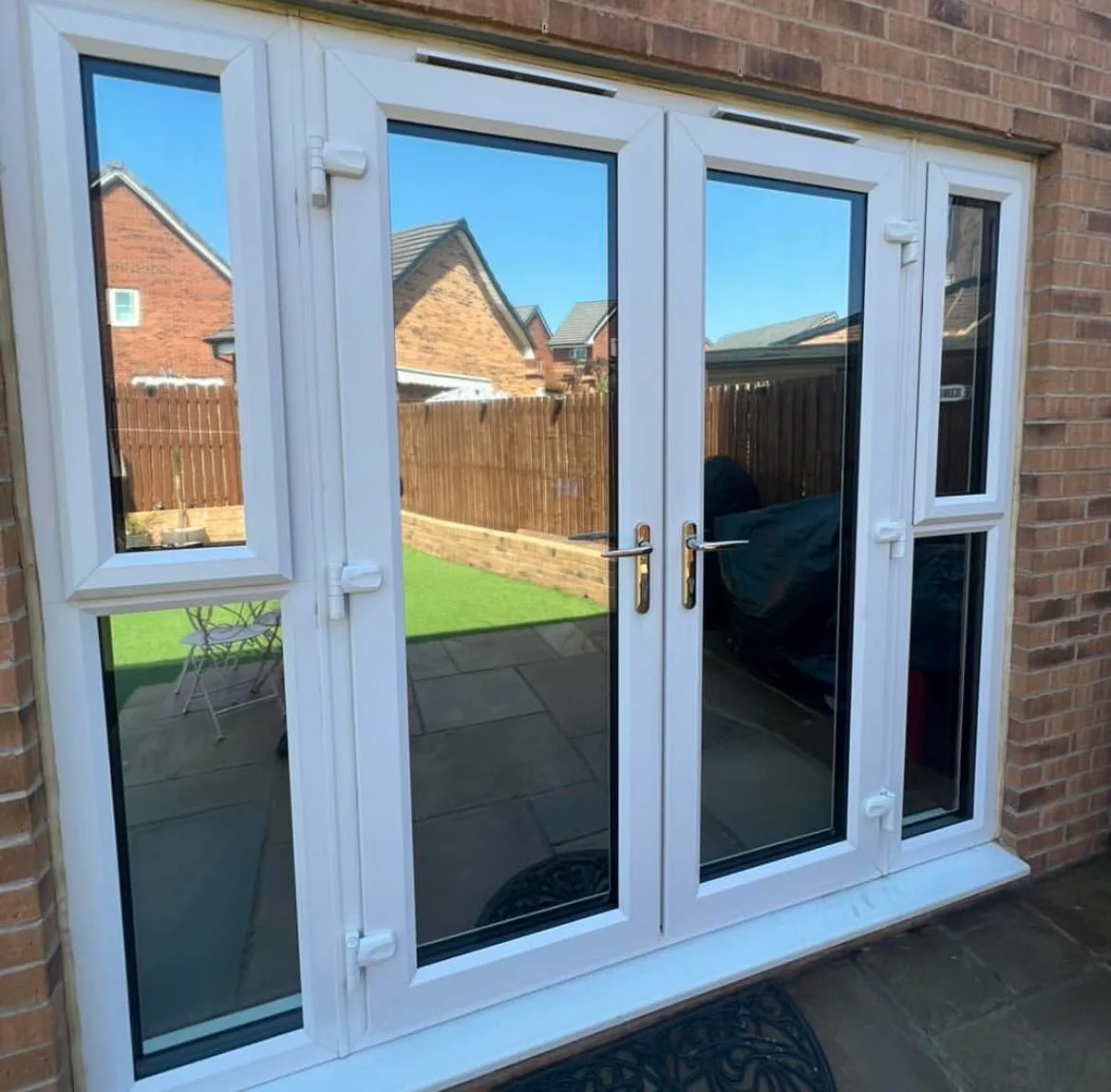Conservatory roof glazing treated with solar control film